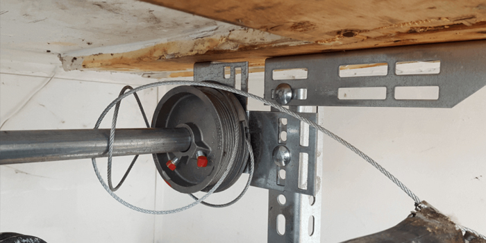 Nurmi Isles fix garage door cable